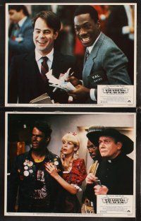 7h678 TRADING PLACES 8 LCs '83 Dan Aykroyd & Eddie Murphy are getting rich & getting even!