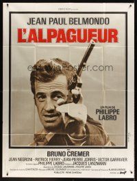 7k467 HUNTER WILL GET YOU French 1p '76 different close up ot Jean-Paul Belmondo with gun!