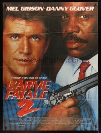 7k522 LETHAL WEAPON 2 French 1p '89 great close-up image of cops Mel Gibson & Danny Glover!