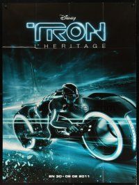 7k709 TRON LEGACY teaser French 1p '10 great different close up image of light cycle!