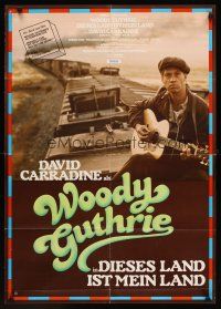 7s096 BOUND FOR GLORY German '76 David Carradine as folk singer Woody Guthrie on top of train!