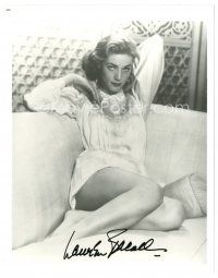 7t707 LAUREN BACALL signed 8x10 REPRO still '80s lounging on couch & showing her sexy legs!