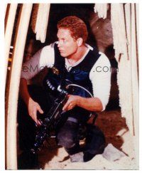 7t554 COLE HAUSER signed color 8x10 REPRO still '02 close up crouching with a big gun!