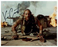 7t691 KEVIN COSTNER signed color 8x10 REPRO still '90s c/u on the ground from Waterworld!