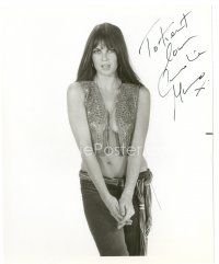 7t262 CAROLINE MUNRO signed 8x10 still '70s super sexy wearing vest without a top!