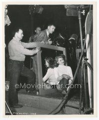7w069 COVER GIRL candid 8x10 still '44 sexy Rita Hayworth relaxing on set waiting for next scene!