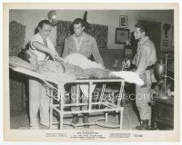 7w298 DISEMBODIED 8x10 still '57 John Wengraf cuts open wounded man's shirt as Paul Burke watches!