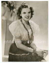 7w455 JUDY GARLAND 6.5x8.25 news photo '41 great seated smiling portrait of the pretty star!