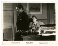 7w578 OUT OF THE PAST 8x10 still '47 Robert Mitchum seated at desk in trench coat & fedora!