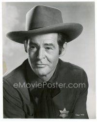7w618 ROBERT RYAN 7.25x9.25 still '56 great portrait wearing cowboy hat & tin star from Proud Ones!