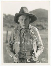 7w700 TEX RITTER 8x10 still '30s cool image of star in cowboy outfit with two guns drawn!