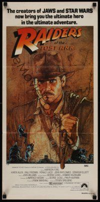 8d851 RAIDERS OF THE LOST ARK Aust daybill'81 great art of adventurer Harrison Ford by Richard Amsel