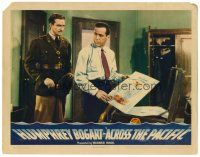 8f298 ACROSS THE PACIFIC LC '42 Army officer Frank Wilcox stares at Humphrey Bogart!