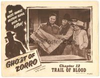 8f518 GHOST OF ZORRO chapter 12 LC '49 Clayton Moore looks at map with Pamela Blake & guy!