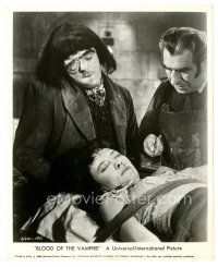 8j099 BLOOD OF THE VAMPIRE 8x10 still '58 Victor Maddern stands over Barbara Shelley on table!
