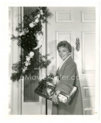 8j509 JOANNA MOORE 8x10 still '50s standing by door holding Christmas presents!