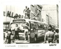 8j873 STAY HUNGRY TV Canadian 8x10 still R80s wild image of muscle-men on beefcake bus!