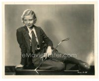 8j945 UNA MERKEL 8x10 still '30s seated on table in riding outfit holding crop!