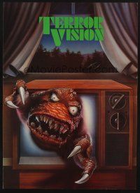 8p175 TERRORVISION promo brochure '86 wacky different image of monster coming out of TV!
