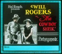 8x056 COWBOY SHEIK glass slide '24 Will Rogers with lasso in hand walking with pretty girl!