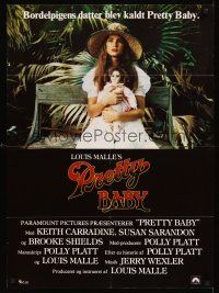 8y463 PRETTY BABY Danish '78 directed by Louis Malle, young Brooke Shields sitting with doll!