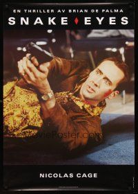 8y054 SNAKE EYES DS Swedish '98 cool close-up of Nicolas Cage on floor with gun!