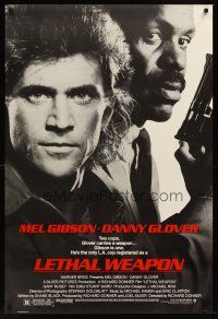 8z449 LETHAL WEAPON 1sh '87 great close image of cop partners Mel Gibson & Danny Glover!