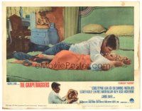 9d293 CARPETBAGGERS LC #7 '64 great close up of Carroll Baker biting George Peppard's hand!