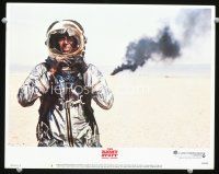 9d731 RIGHT STUFF LC #3 '83 close up of injured Sam Shepard walking away from wreck!