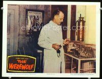 9d957 WEREWOLF LC '56 man in lab coat holding goggles by pets in cages!