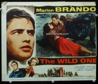 9d968 WILD ONE LC '53 close up of Marlon Brando hugging Mary Murphy on ground by his motorcycle!