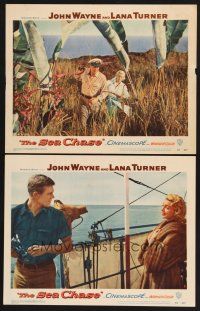 9g952 SEA CHASE 2 LCs '55 sexy Lana Turner & John Wayne walking through tall grass!