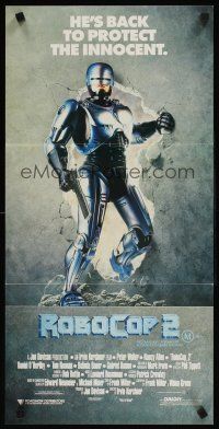 9p846 ROBOCOP 2 Aust daybill '90 cyborg policeman Peter Weller busts through wall, scii-fi sequel!