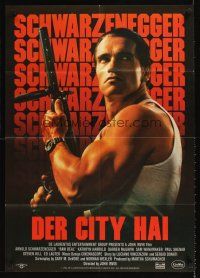 9p284 RAW DEAL German '86 great close up of tough guy Arnold Schwarzenegger with gun!