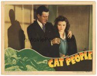 1c269 CAT PEOPLE LC '42 great close up of Tom Conway putting sexy Simone Simon's coat on her!