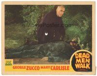 1c288 DEAD MEN WALK LC '43 close up of George Zucco kneeling over dead body in forest!