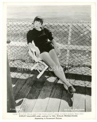 1m611 SHIRLEY MACLAINE 8x10 still '55 sitting on a chair at the beach showing her sexy legs!