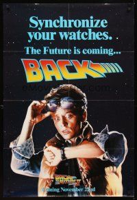 1r075 BACK TO THE FUTURE II teaser 1sh '89 art of Michael J. Fox as Marty, synchronize your watch!