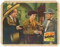 1s318 BULLFIGHTERS LC '45 Oliver Hardy watches Richard Lane pour drink for matador Stan Laurel!