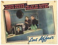 1s619 LOVE AFFAIR LC '39 Charles Boyer looks suspiciously at the photo on Irene Dunne's mantle!