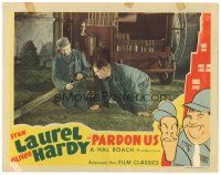 1s722 PARDON US LC R44 Oliver Hardy looks directly into fire hose Stan Laurel is holding!