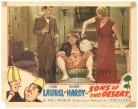 1s846 SONS OF THE DESERT LC R45 Stan Laurel watches as Mae Bush tends to a sick Oliver Hardy!