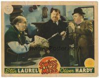 1s869 SWISS MISS LC '38 Oliver Hardy watches Stan Laurel drill larger holes in the cheese!
