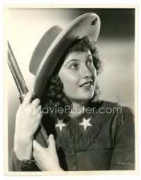 2a271 BARBARA STANWYCK signed 8x10 still '35 portrait as Annie Oakley with rifle by Ernest Bachrach