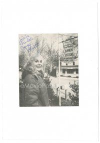 2a444 JUNE HAVOC signed 4.25x5.25 postcard '86 standing by her Cannon Crossing crafts & food shop!