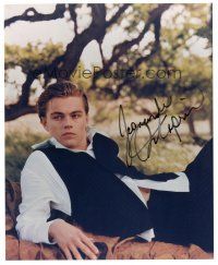 2a866 LEONARDO DICAPRIO signed color 8x10 REPRO still '00s c/u of the star laying down outside!