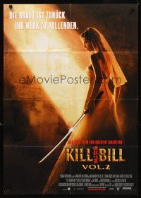 2b240 KILL BILL: VOL. 2 German '04 bride Uma Thurman with katana, Quentin Tarantino