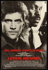 2c383 LETHAL WEAPON 1sh '87 great close image of cop partners Mel Gibson & Danny Glover!