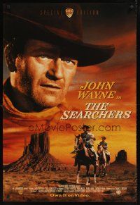2c604 SEARCHERS video 1sh R98 great close-up of John Wayne in Monument Valley, John Ford!