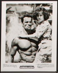 2e022 COMMANDO presskit w/ 12 stills '85 Arnold Schwarzenegger is going to make someone pay!